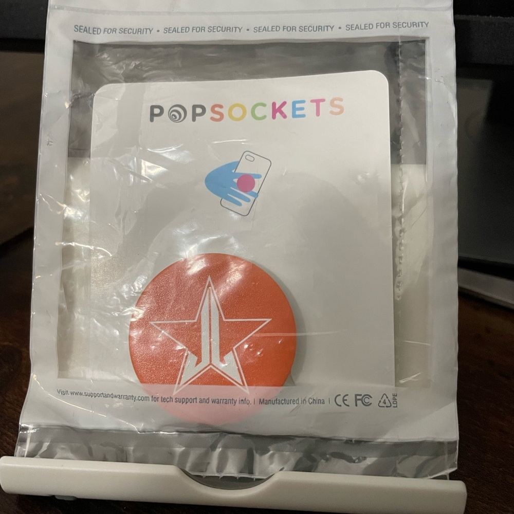 Jeffree Star Orange and White PopSocket